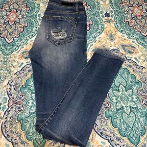 Buckle super skinny jeans